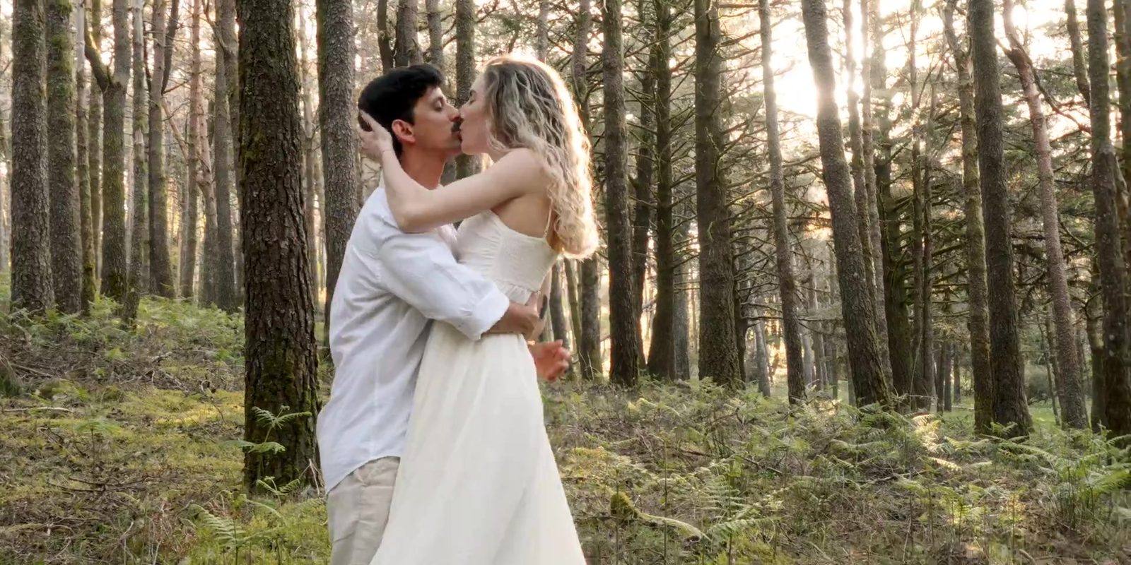 Couple in a sunlit forest in Madeira